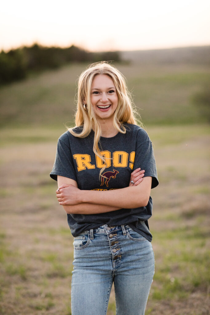 Outdoor senior photos in North Texas at sunset