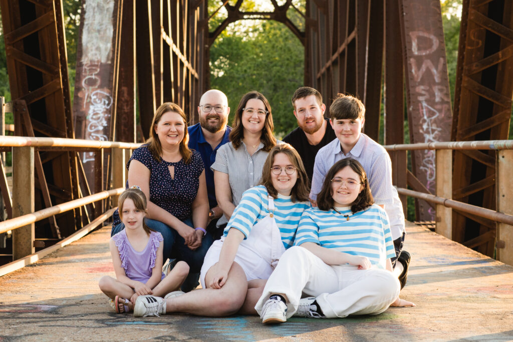 Extended family photos on bridge