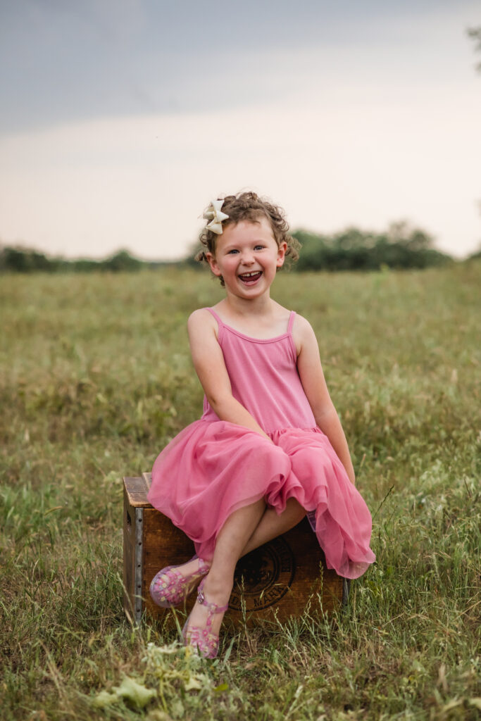 Outdoor North Texas family photos in a pasture