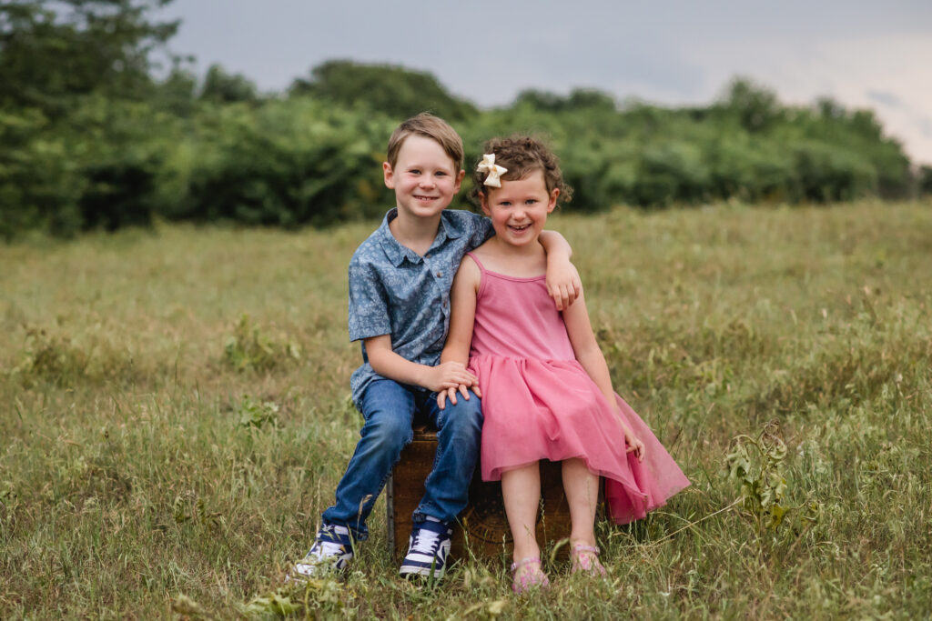 Outdoor North Texas family photos in a pasture