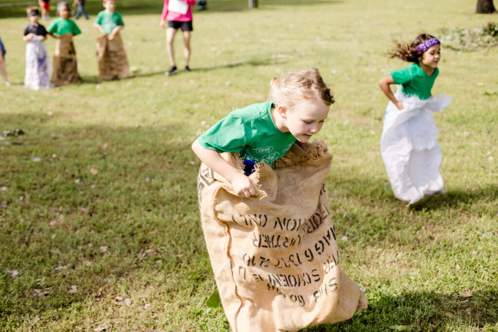 Potato sack race at homeschool field day